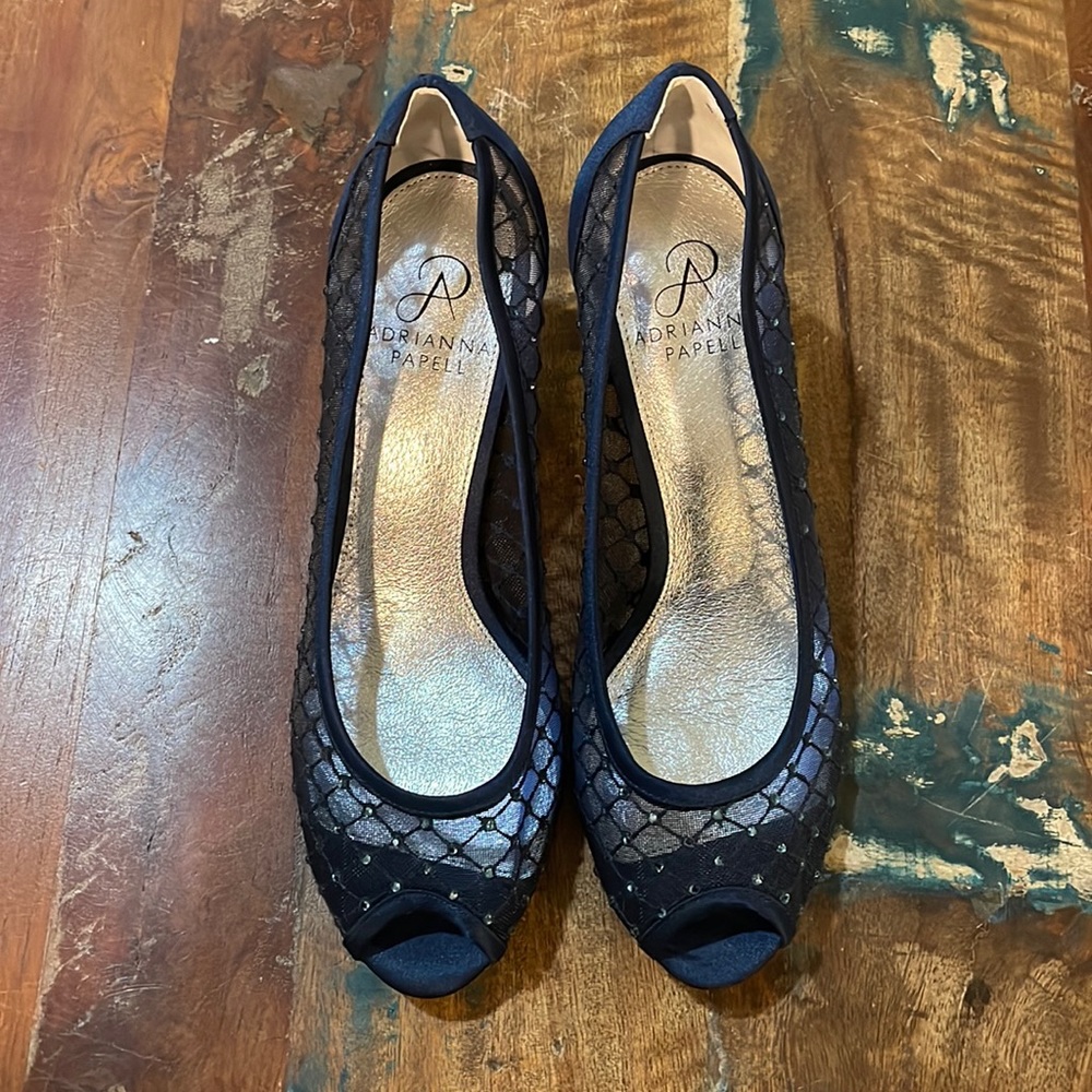 Short heels. Navy Blue, mesh sequin sides and toe. Women’s Size 7.5.
